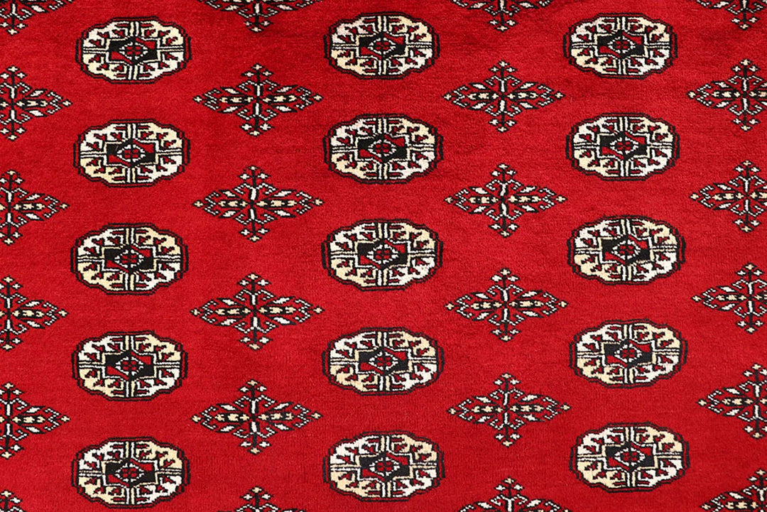 Red Pakistani Bokhara Rug 9' x 11'10" Hand-Knotted | No. QA45549
