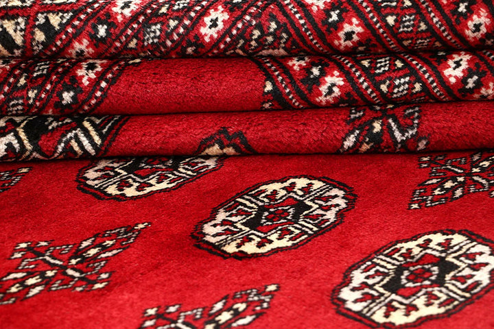 Red Pakistani Bokhara Rug 9' x 11'10" Hand-Knotted | No. QA45549