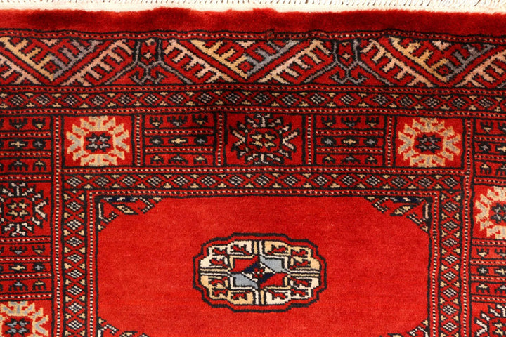 Red Pakistani Bokhara Rug 2' 7" x 9' 3" Hand-Knotted | No. QA46029