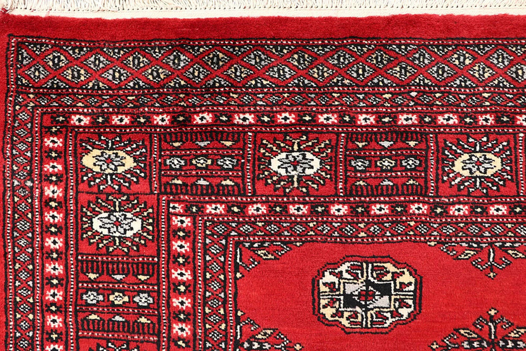 Red Bokhara Rug 5' 6" x 8' 2" Hand-Knotted | No. QA46441