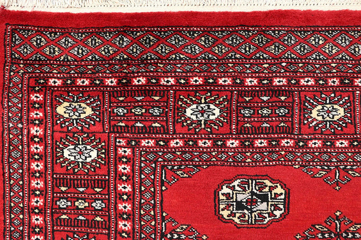 Red Bokhara Rug 5' 6" x 8' 2" Hand-Knotted | No. QA46441