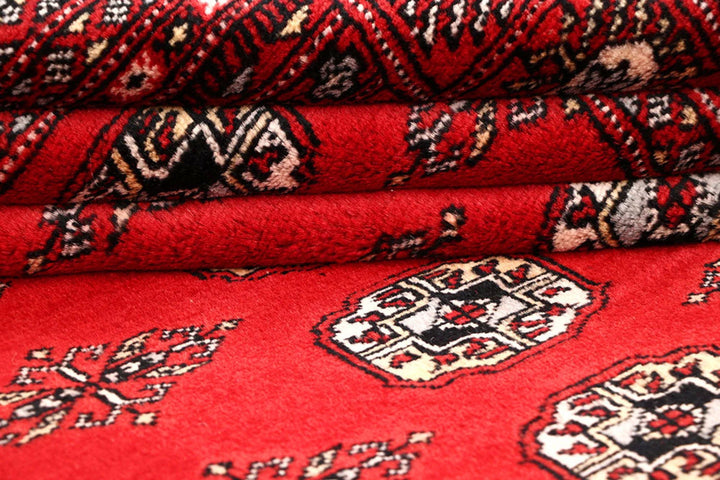 Red Bokhara Rug 5' 6" x 8' 2" Hand-Knotted | No. QA46441