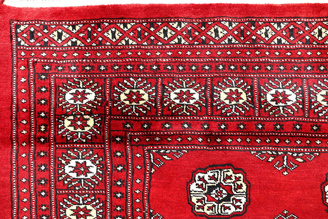 Firebrick Pakistani Bokhara Rug 5' 2" x 9' 1" Hand-Knotted | No. QA46764