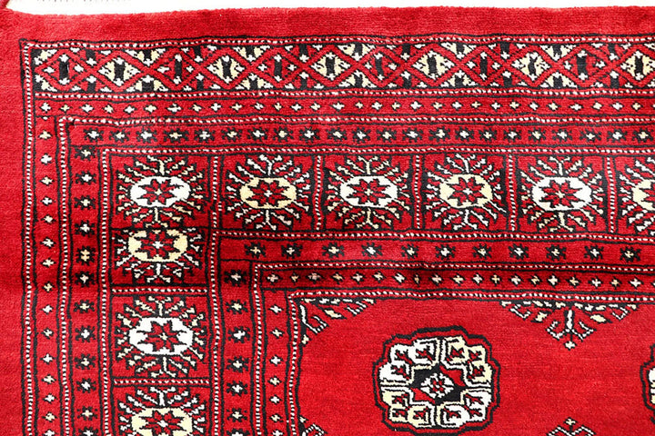 Firebrick Pakistani Bokhara Rug 5' 2" x 9' 1" Hand-Knotted | No. QA46764