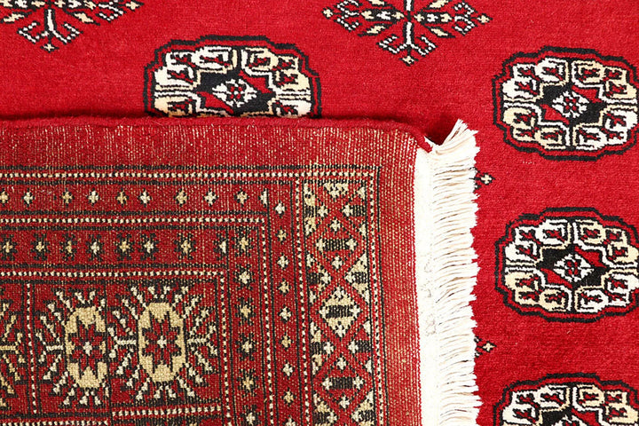 Firebrick Pakistani Bokhara Rug 5' 2" x 9' 1" Hand-Knotted | No. QA46764