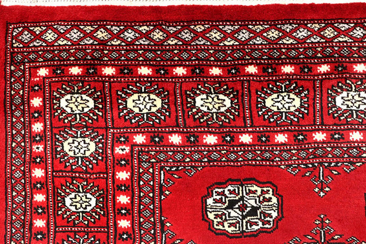 Red Pakistani Bokhara Rug 4' 2" x 6' 8" Hand-Knotted | No. QA47148