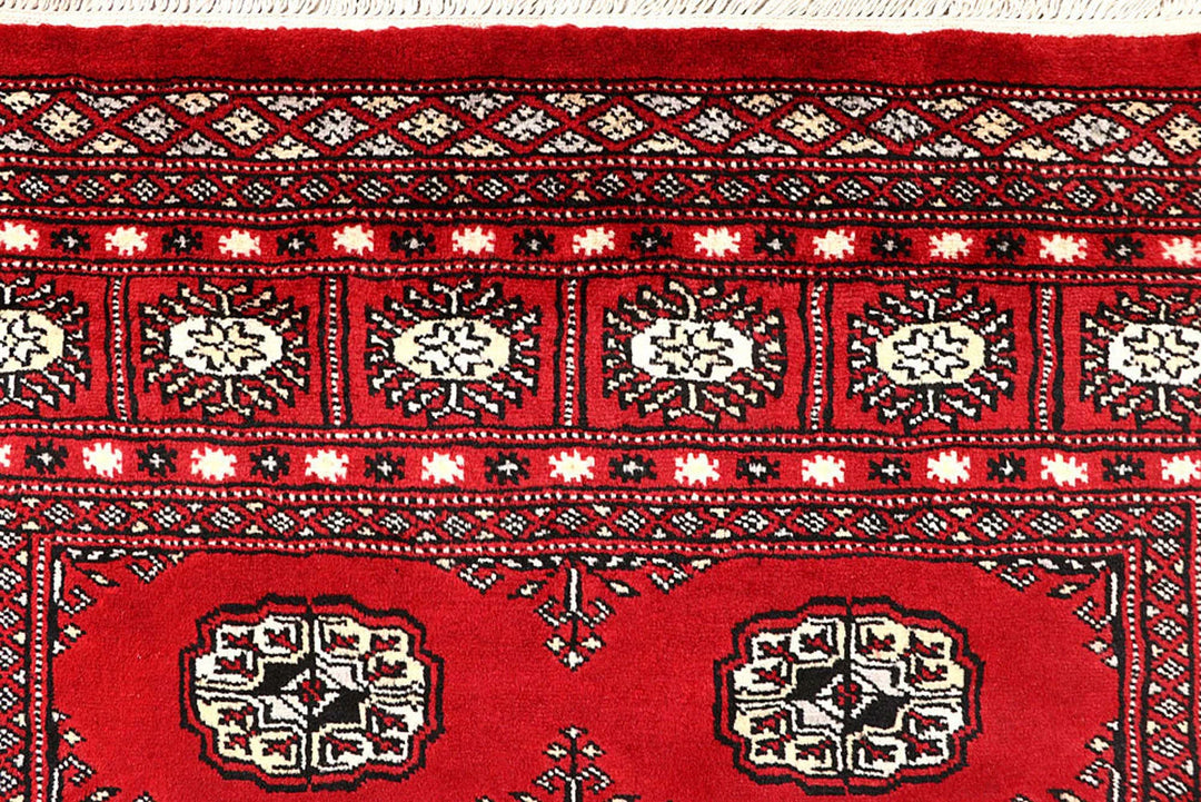 Red Pakistani Bokhara Rug 4' 2" x 6' 8" Hand-Knotted | No. QA47148