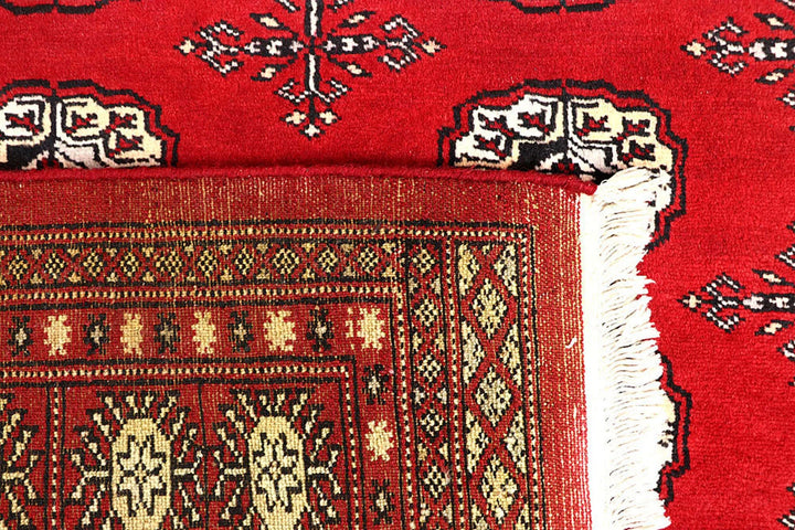 Red Pakistani Bokhara Rug 4' 2" x 6' 8" Hand-Knotted | No. QA47148