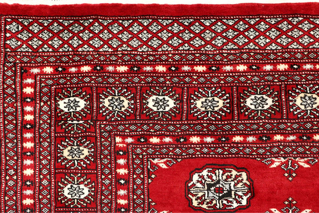 Firebrick Pakistani Bokhara Rug 7' 1" x 8' 8" Hand-Knotted | No. QA47224
