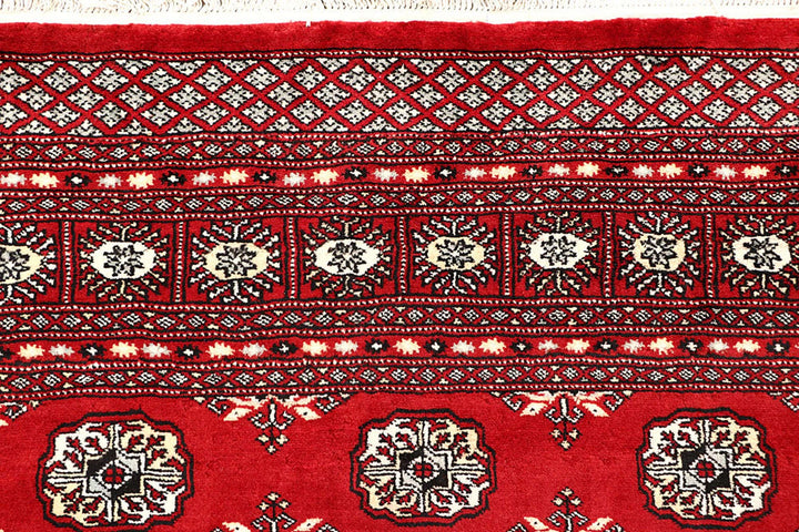 Firebrick Pakistani Bokhara Rug 7' 1" x 8' 8" Hand-Knotted | No. QA47224
