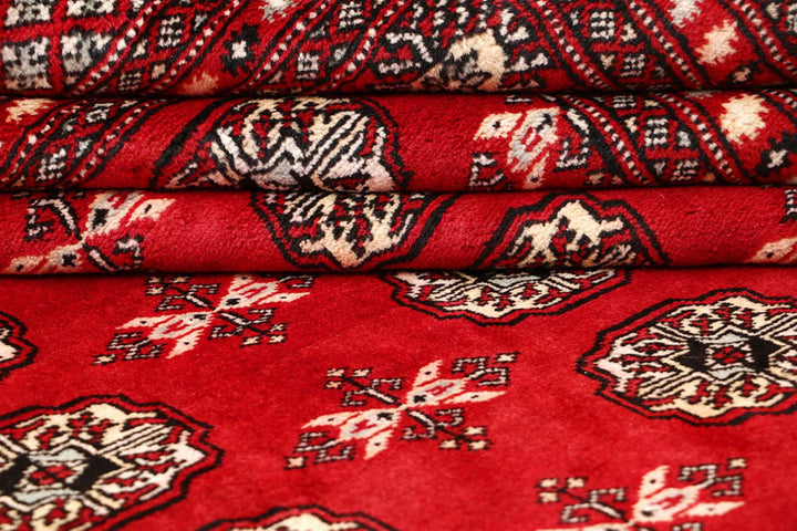 Firebrick Pakistani Bokhara Rug 7' 1" x 8' 8" Hand-Knotted | No. QA47224