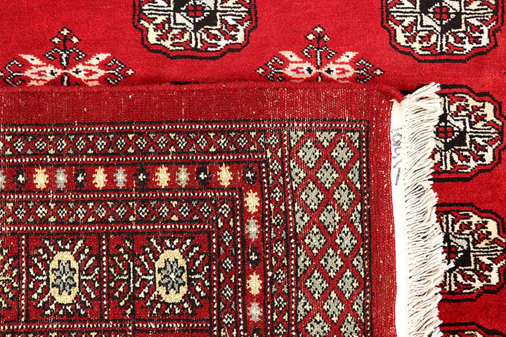 Firebrick Pakistani Bokhara Rug 7' 1" x 8' 8" Hand-Knotted | No. QA47224