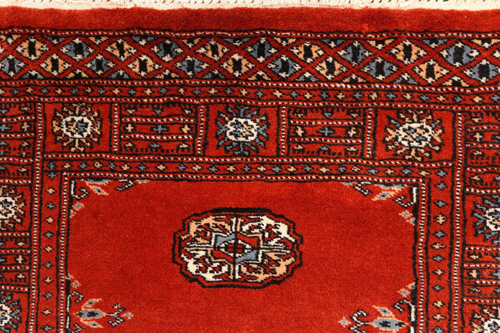 Dark Red Pakistani Bokhara Rug 2' 7" x 10' 3" Hand-Knotted | No. QA47484