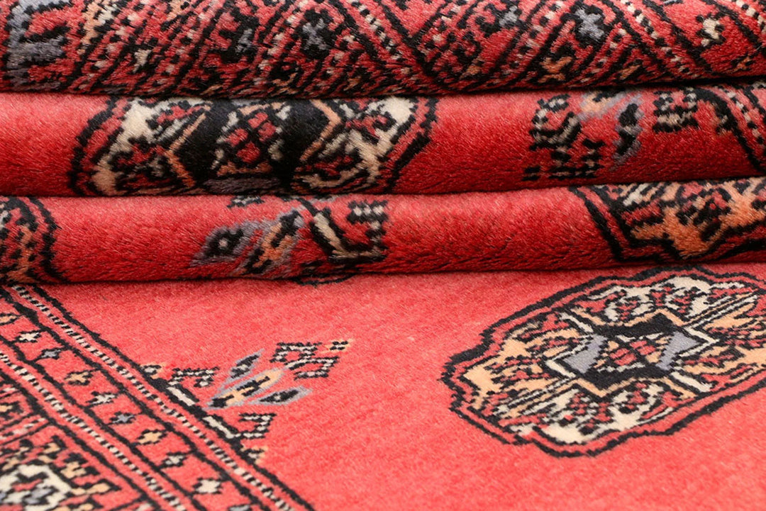 Salmon Pakistani Bokhara Rug 3' 1" x 6' Hand-Knotted | No. QA48418