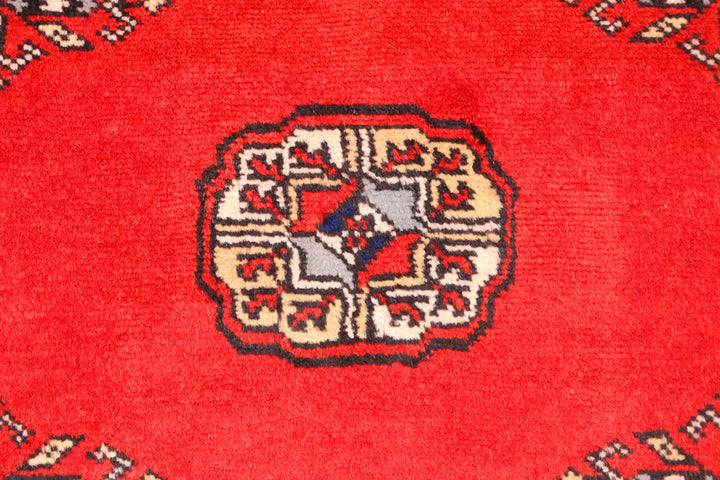 Red Pakistani Bokhara Rug 2' 6" x 10' 8" Hand-Knotted | No. QA48610