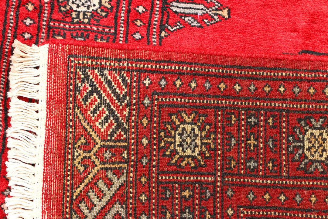 Red Pakistani Bokhara Rug 2' 6" x 6' 8" Hand-Knotted | No. QA48992