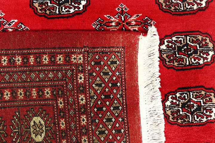 Firebrick Red Pakistani Bokhara Rug 7' 10" x 10' Hand-Knotted | No. QA49243