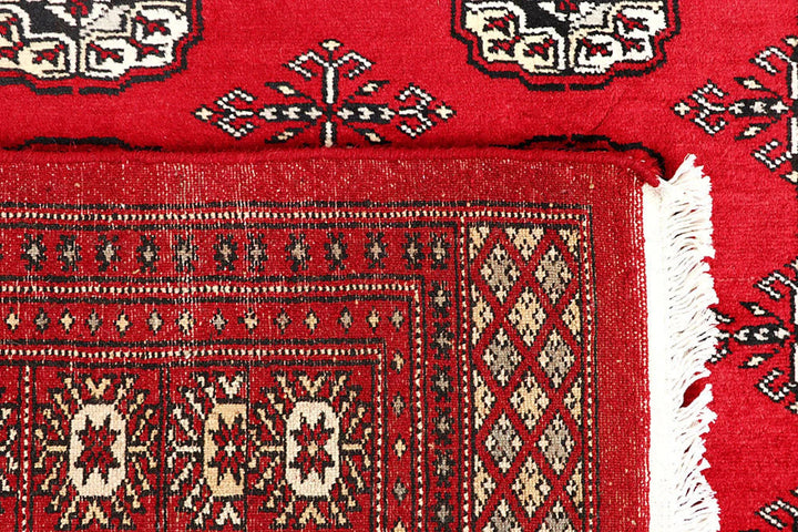 Red Pakistani Bokhara Rug 4' 1" x 6' 1" Hand-Knotted | No. QA49265