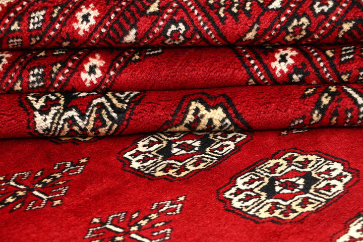 Red Pakistani Bokhara Rug 8' 11" x 12' 6" Hand-Knotted | No. QA49325
