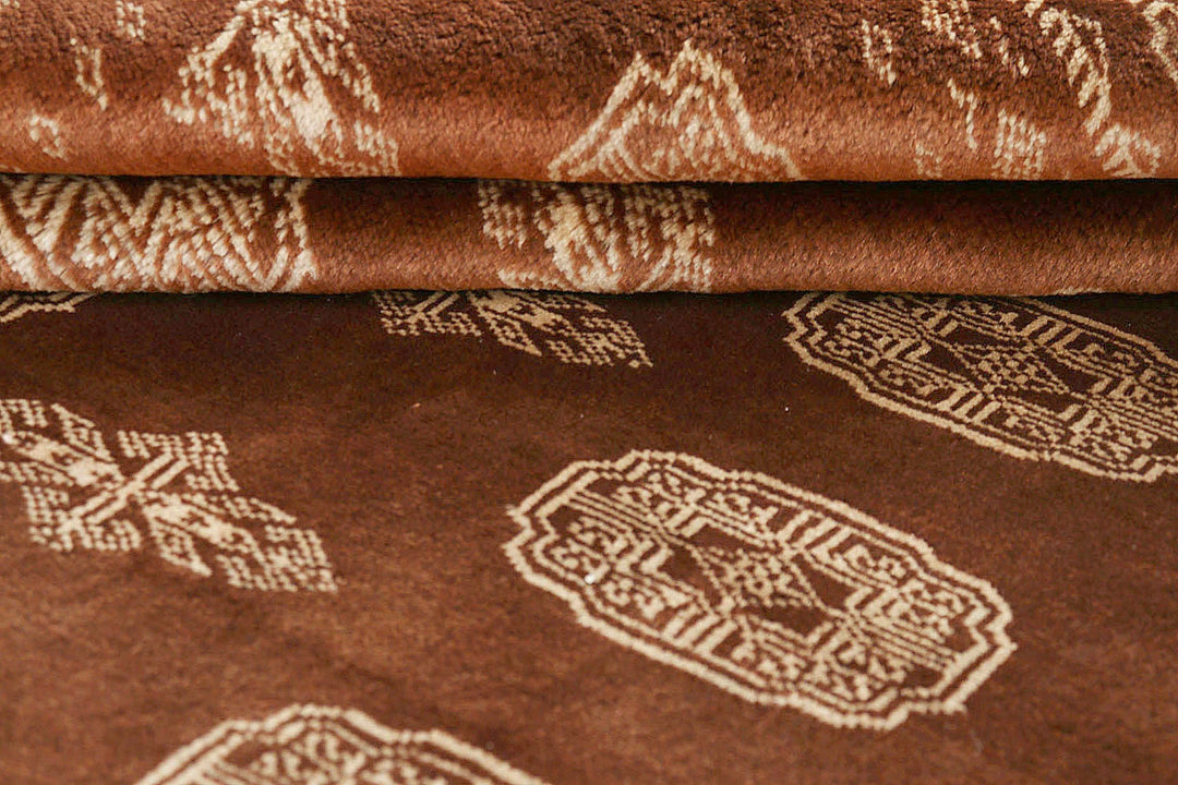 Saddle Brown Pakistani Bokhara Rug 6' 4" x 8' 10" Hand-Knotted | No. QA49481