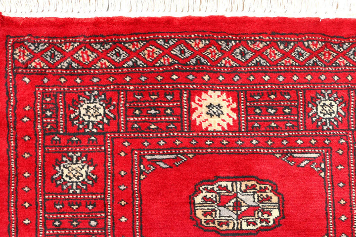 Red Bokhara Rug 2' 6" x 6' 5" Hand-Knotted | No. QA50060