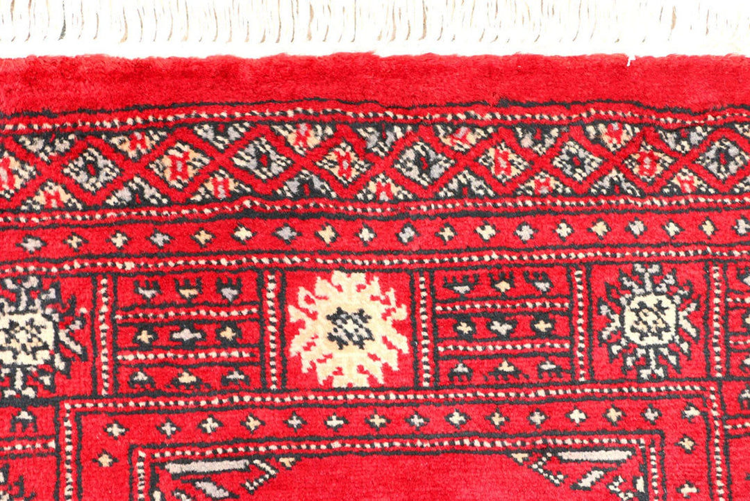 Red Bokhara Rug 2' 6" x 6' 5" Hand-Knotted | No. QA50060