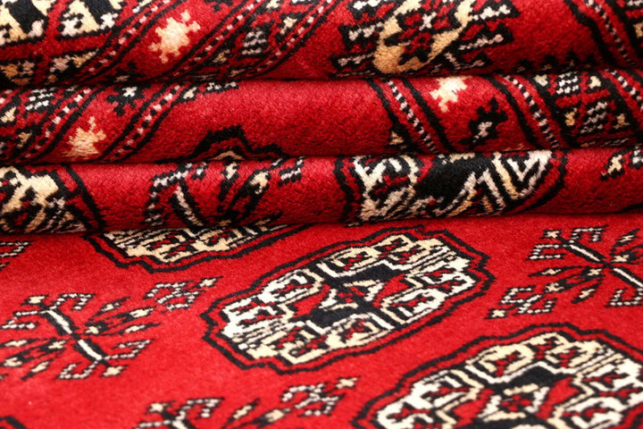 Red Bokhara Rug 4' 11" x 8' 1" Hand-Knotted | No. QA50135