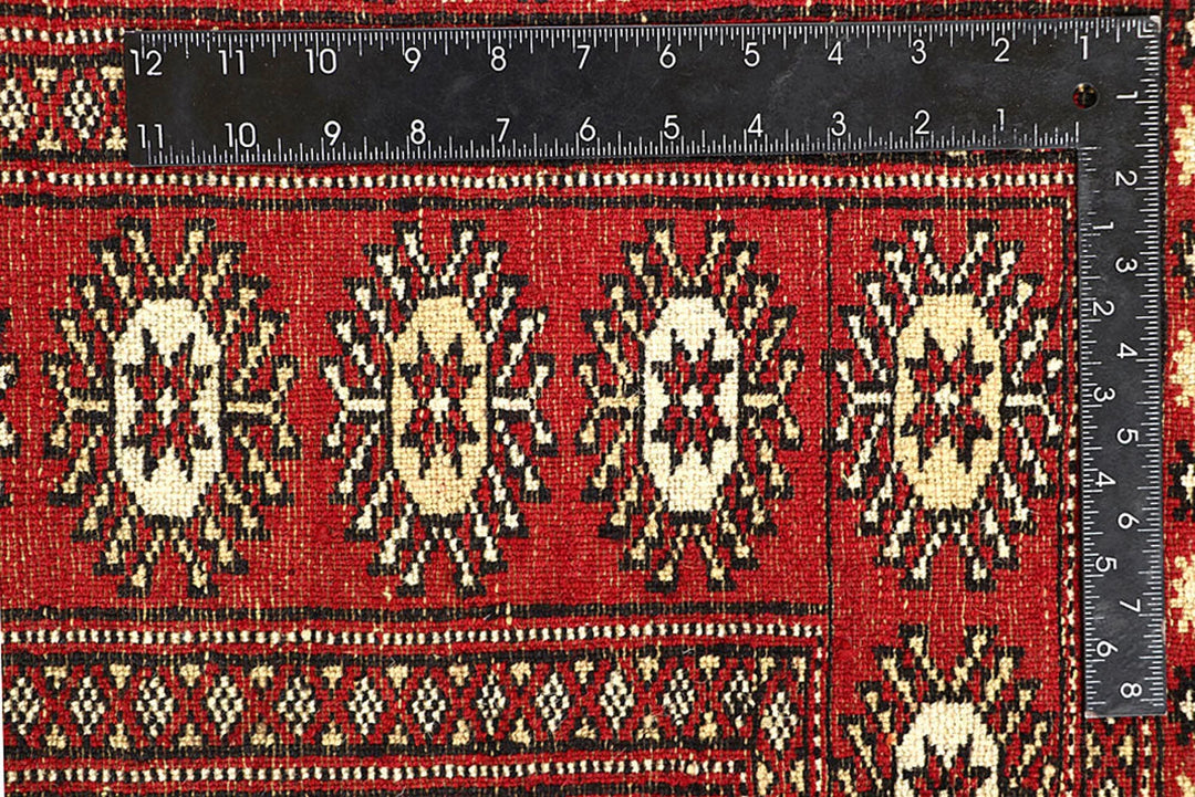 Red Bokhara Rug 4' 11" x 8' 1" Hand-Knotted | No. QA50135