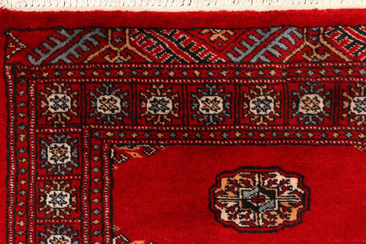 Red Pakistani Bokhara Rug 2' 6" x 9' 2" Hand-Knotted | No. QA50265