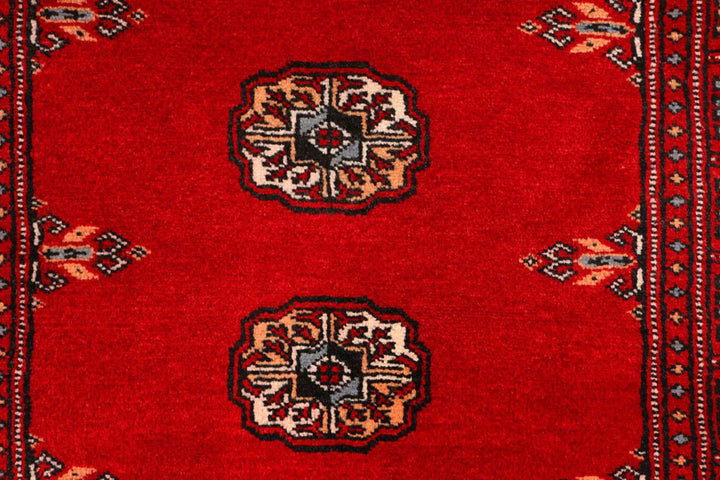 Red Pakistani Bokhara Rug 2' 6" x 9' 2" Hand-Knotted | No. QA50265