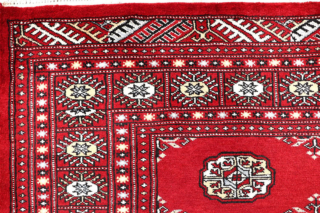 Firebrick Red Pakistani Bokhara Rug 5' 1" x 8' 2" Hand-Knotted | No. QA50273