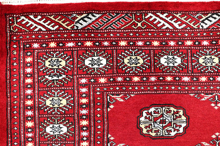 Firebrick Red Pakistani Bokhara Rug 5' 1" x 8' 2" Hand-Knotted | No. QA50273
