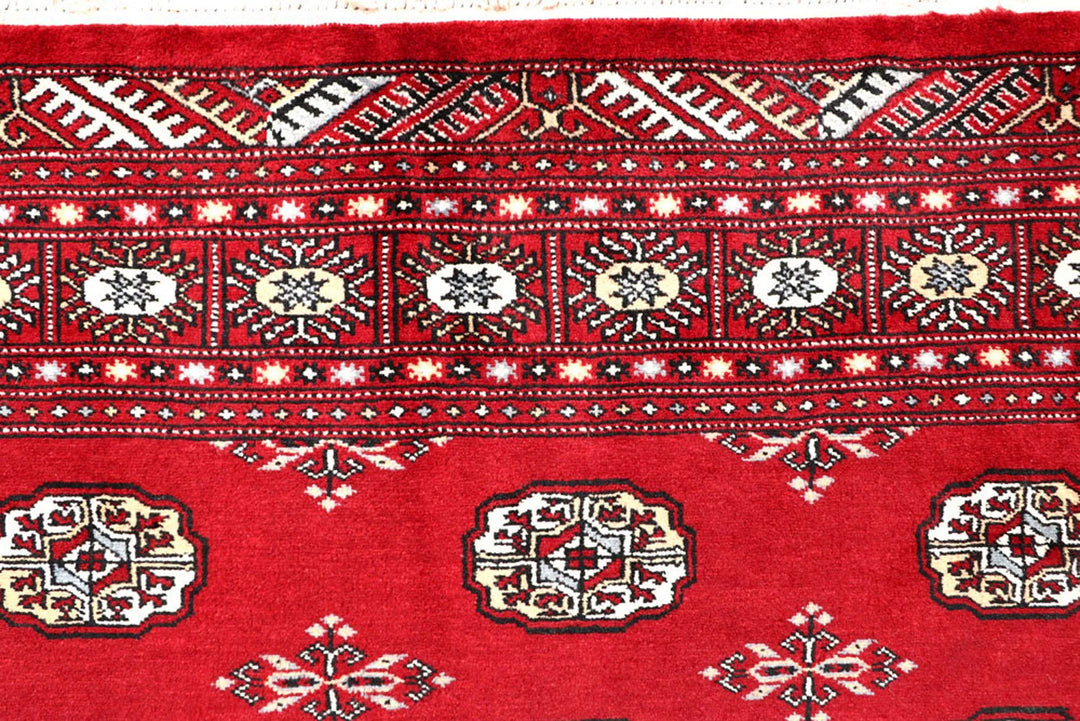 Firebrick Red Pakistani Bokhara Rug 5' 1" x 8' 2" Hand-Knotted | No. QA50273