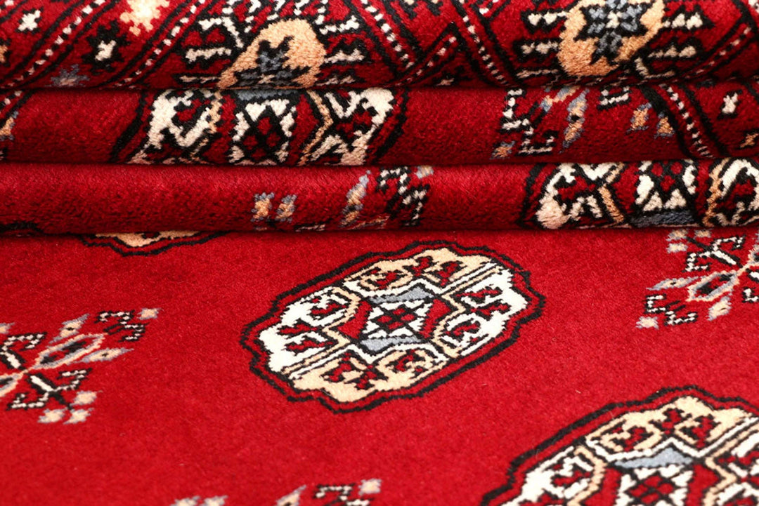 Firebrick Red Pakistani Bokhara Rug 5' 1" x 8' 2" Hand-Knotted | No. QA50273