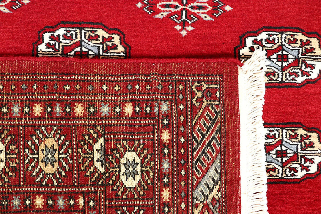 Firebrick Red Pakistani Bokhara Rug 5' 1" x 8' 2" Hand-Knotted | No. QA50273