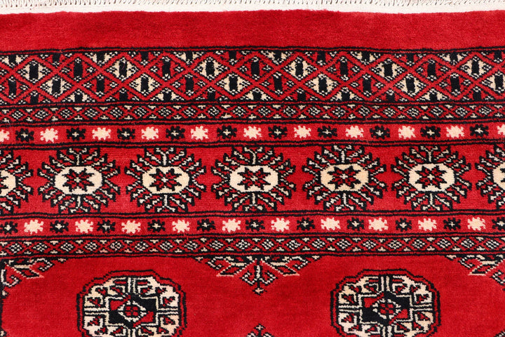 Red Pakistani Bokhara Rug 4' 1" x 5' 11" Hand-Knotted | No. QA50615