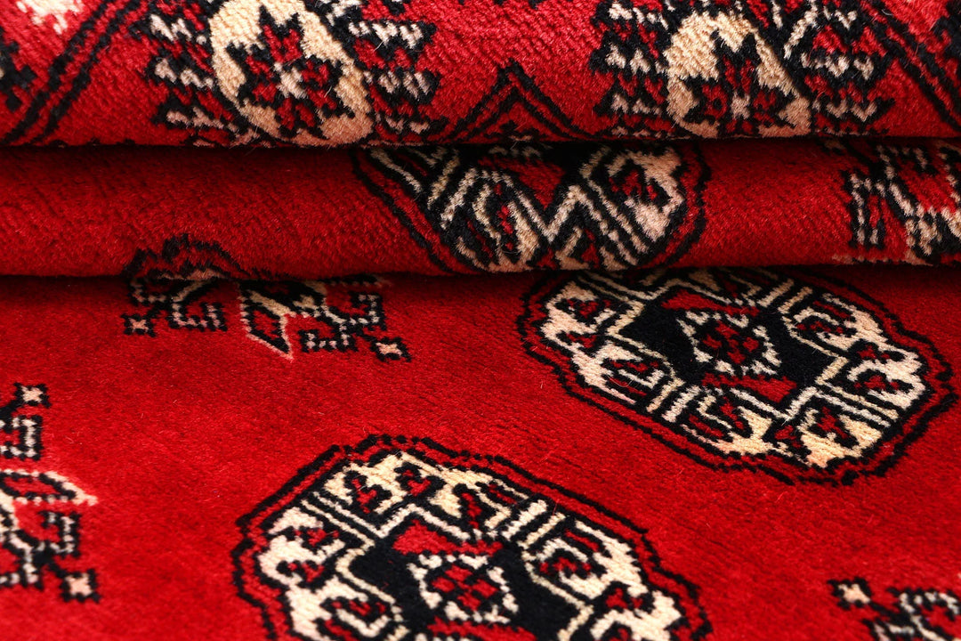 Red Pakistani Bokhara Rug 4' 1" x 5' 11" Hand-Knotted | No. QA50615