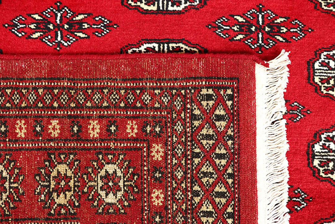Red Bokhara Rug 4' 11" x 8' 4" Hand-Knotted | No. QA50662