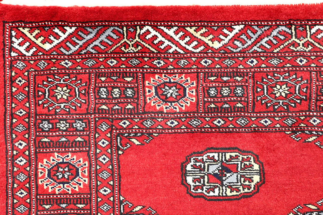 Red Pakistani Bokhara Rug 4' x 6' 2" Hand-Knotted | No. QA51218