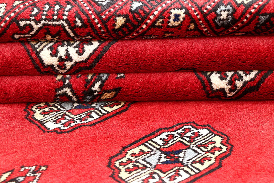 Red Pakistani Bokhara Rug 4' x 6' 2" Hand-Knotted | No. QA51218