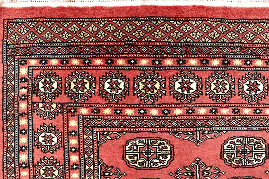 Light Coral Pakistani Bokhara Rug 6' 1" x 9' 5" Hand-Knotted | No. QA51301