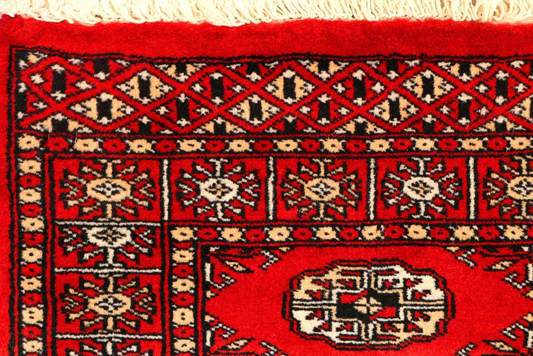 Red Pakistani Bokhara Rug 2' 7" x 8' 7" Hand-Knotted | No. QA51865