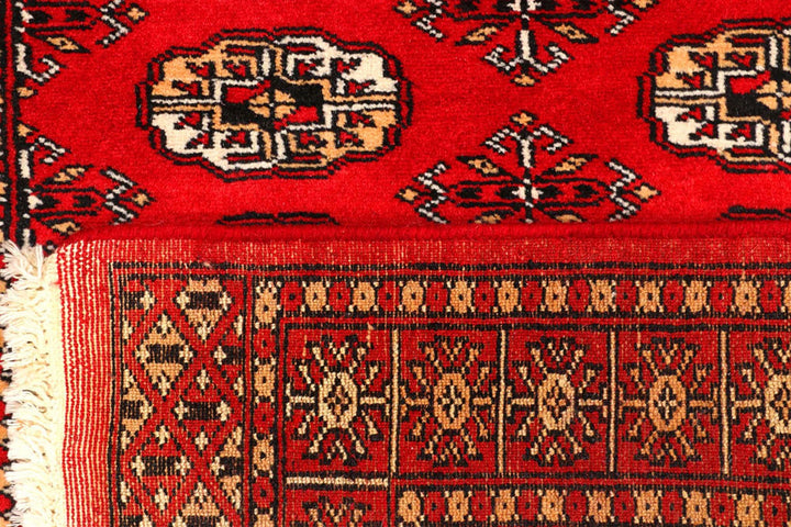 Red Pakistani Bokhara Rug 2' 7" x 8' 7" Hand-Knotted | No. QA51865