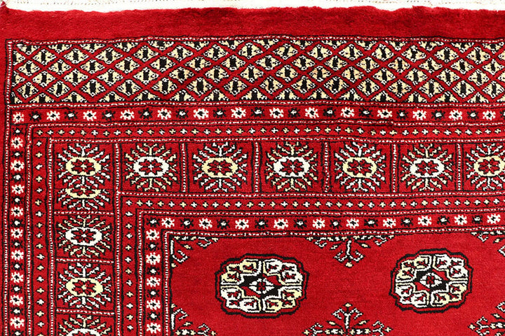 Red Pakistani Bokhara Rug 6' 1" x 9' 1" Hand-Knotted | No. QA53301