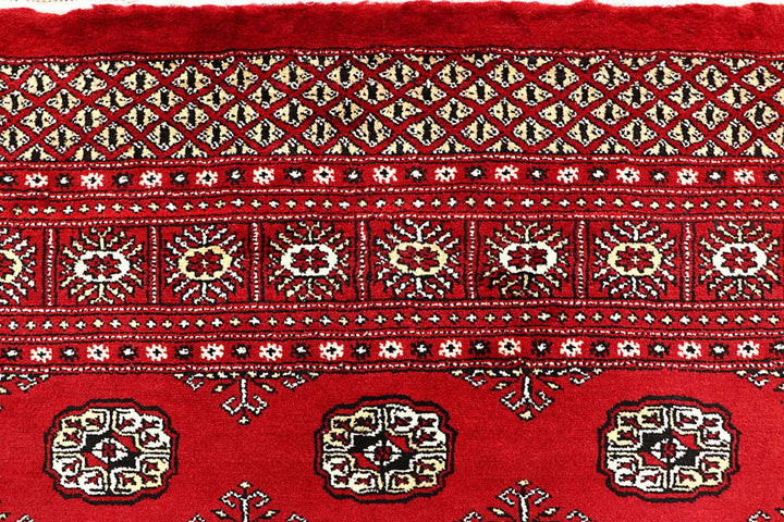 Red Pakistani Bokhara Rug 6' 1" x 9' 1" Hand-Knotted | No. QA53301