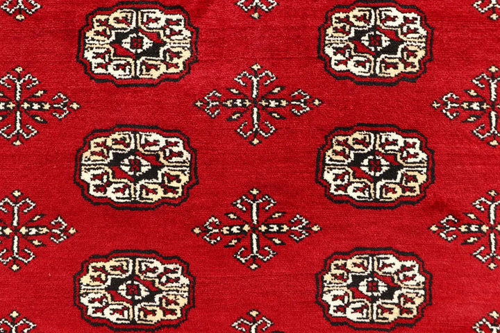 Red Pakistani Bokhara Rug 6' 1" x 9' 1" Hand-Knotted | No. QA53301