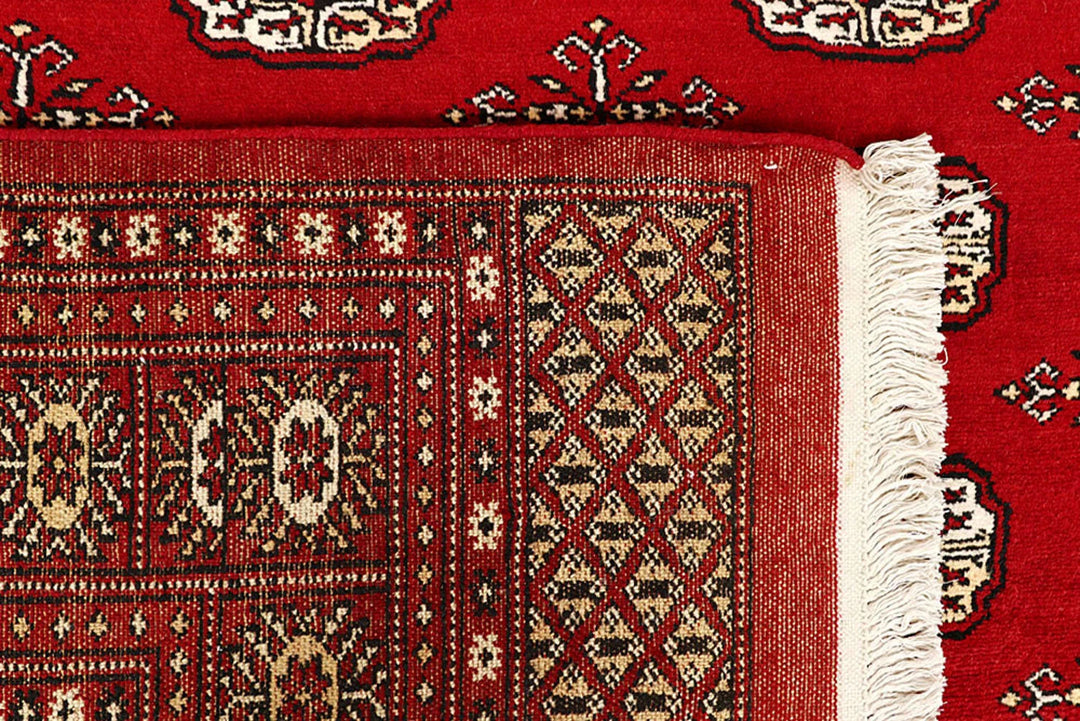 Red Pakistani Bokhara Rug 6' 1" x 9' 1" Hand-Knotted | No. QA53301