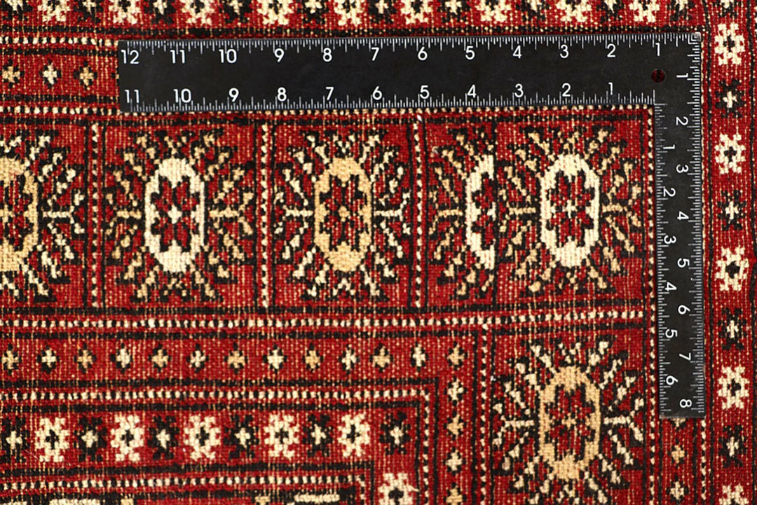 Red Pakistani Bokhara Rug 6' 1" x 9' 1" Hand-Knotted | No. QA53301
