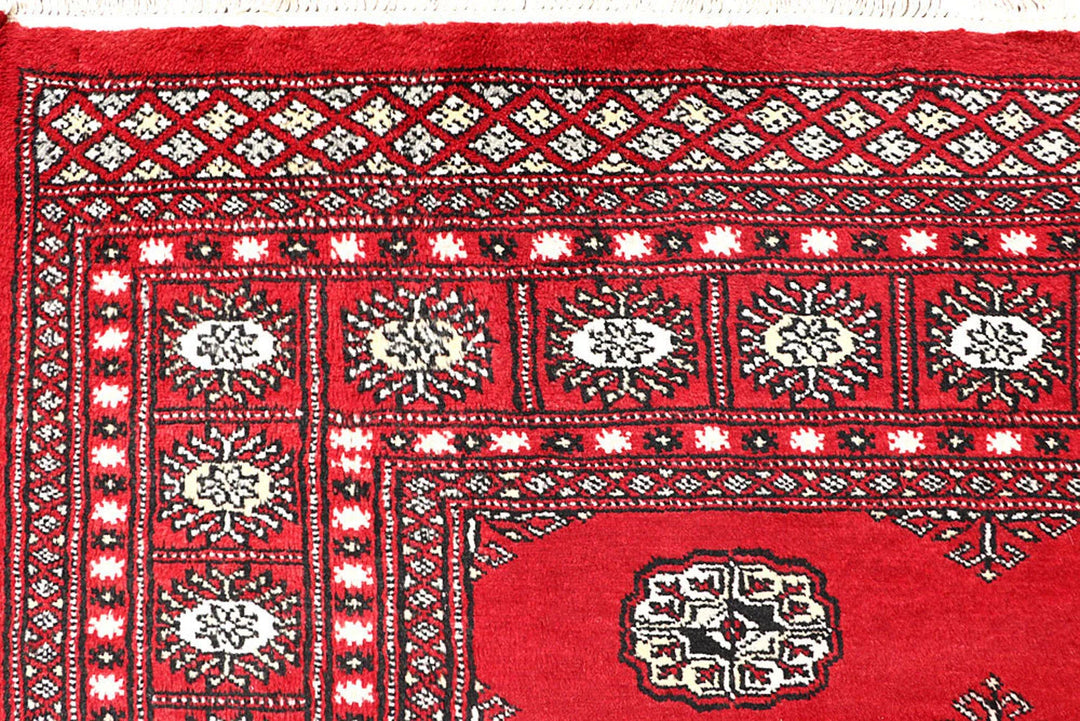 Red Pakistani Bokhara Rug 5' 9" x 8' 2" Hand-Knotted | No. QA53424