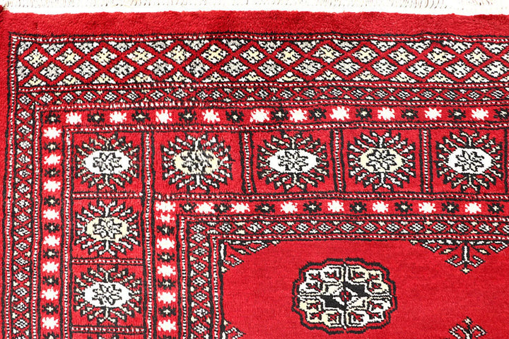 Red Pakistani Bokhara Rug 5' 9" x 8' 2" Hand-Knotted | No. QA53424